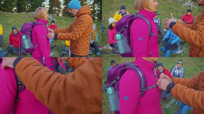 徒步旅行指南向徒步旅行者展示了将背包固定在一起的正确方法