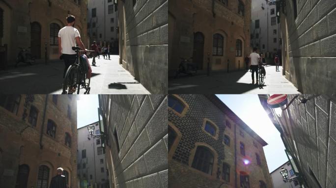 意大利佛罗伦萨骑自行车的时髦男人