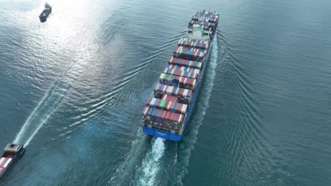 Aerial footage of sea freight ship sailing in Shen