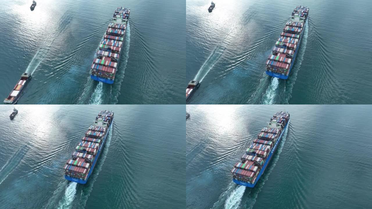 Aerial footage of sea freight ship sailing in Shen