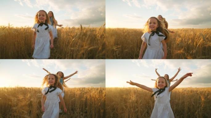三个小姐妹在金色的麦田上奔跑，享受快乐，快乐和快乐的孩子们