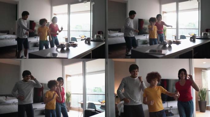 一家人一起跳舞，在家用手机分享