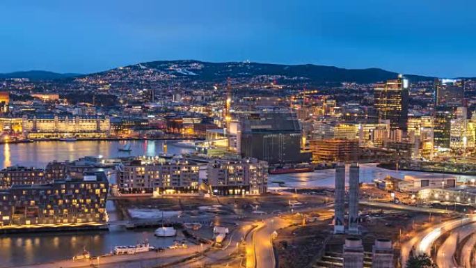 奥斯陆挪威延时4K，鸟瞰图城市天际线昼夜日落延时在商业区和Bercode项目
