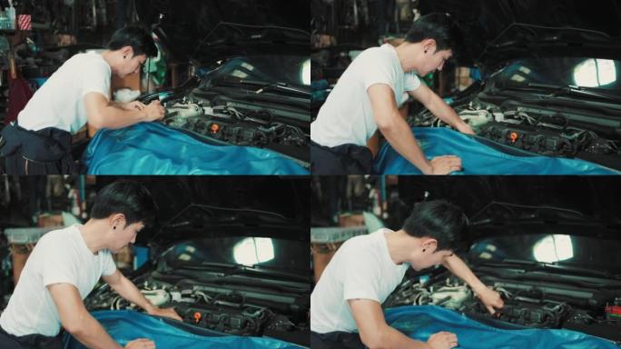 在汽车服务公司修理车辆的机械师