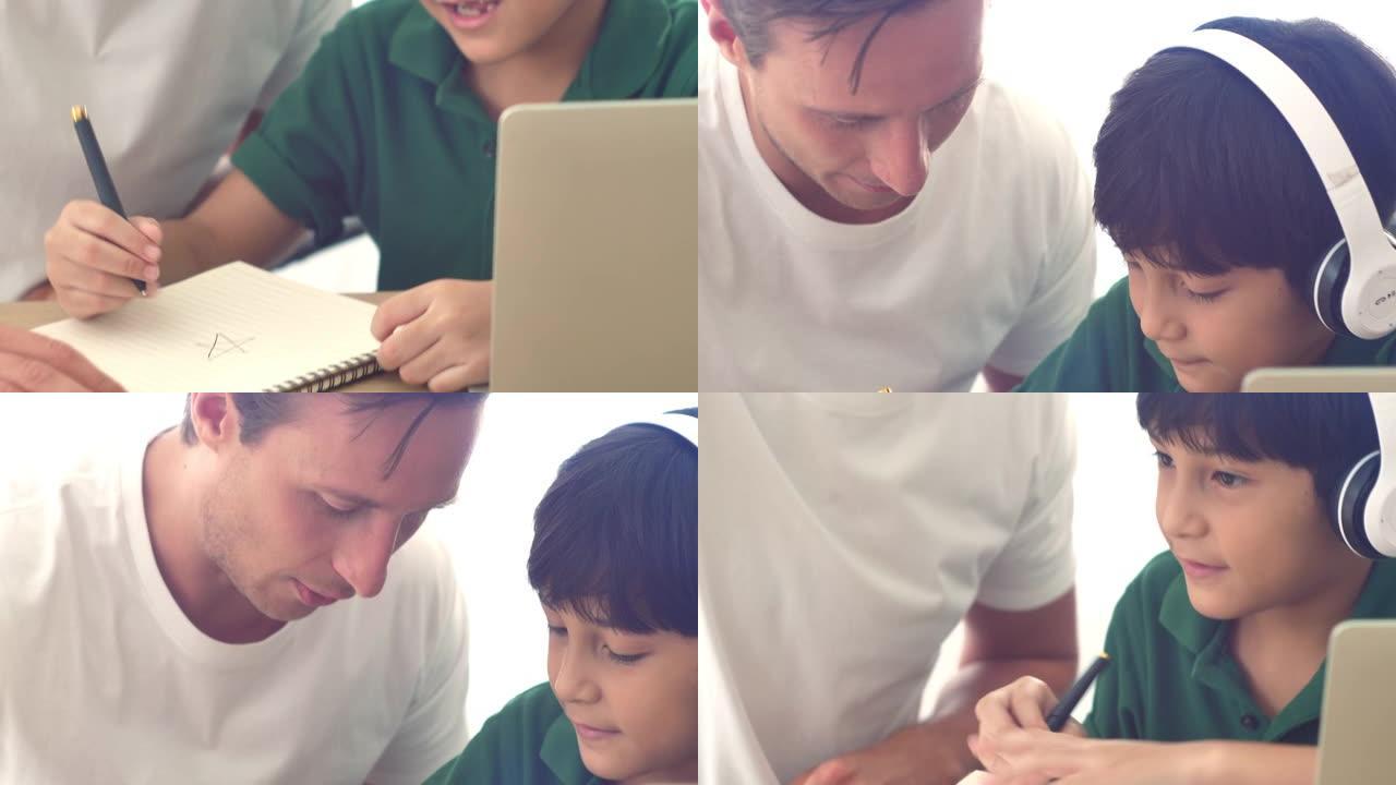 父亲在电子学习时向儿子解释课程。