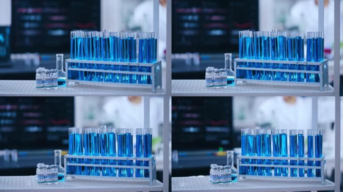 卫生实验室对抗大流行的桌上冠状病毒疫苗瓶