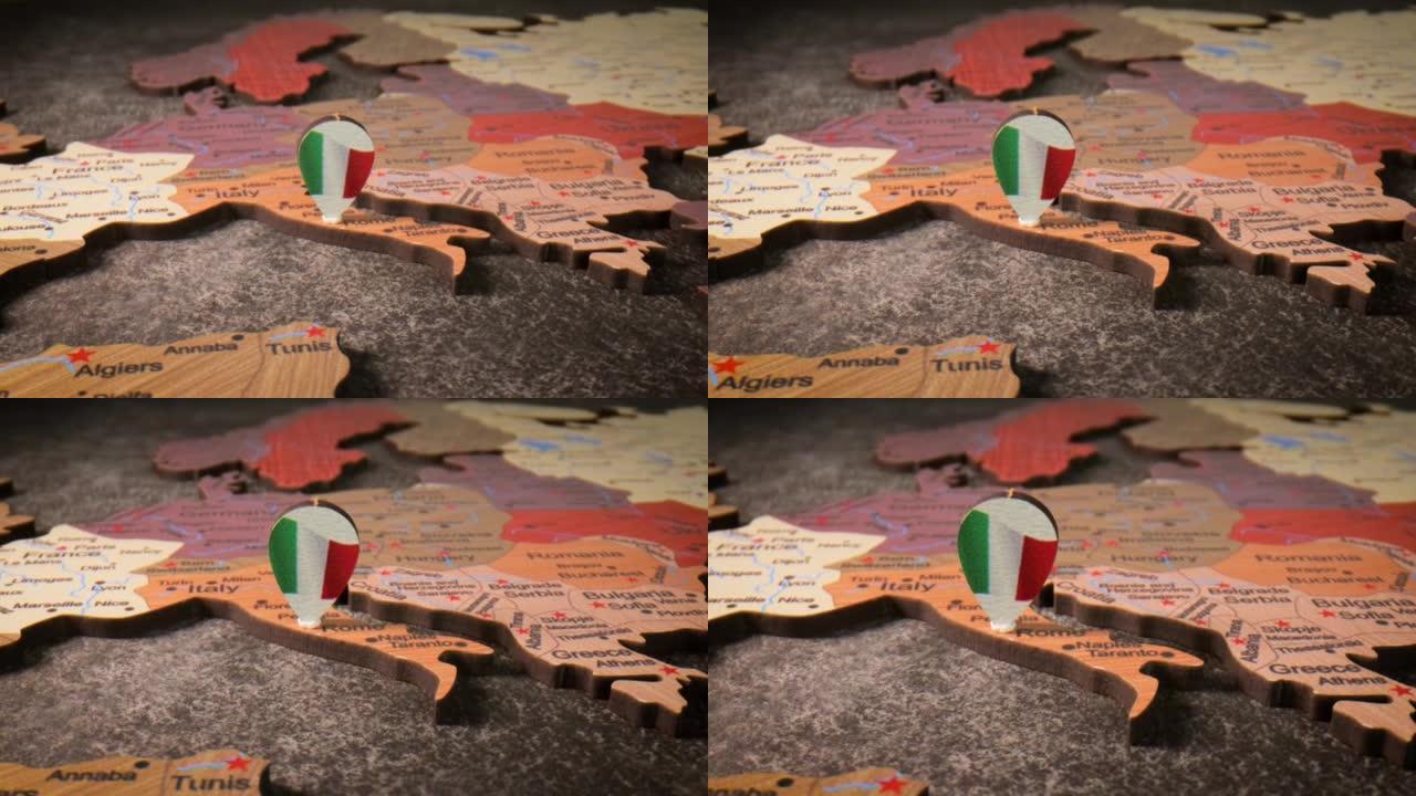 意大利-世界地图上的旅行概念图钉。地图上的定位点指向意大利首都罗马。