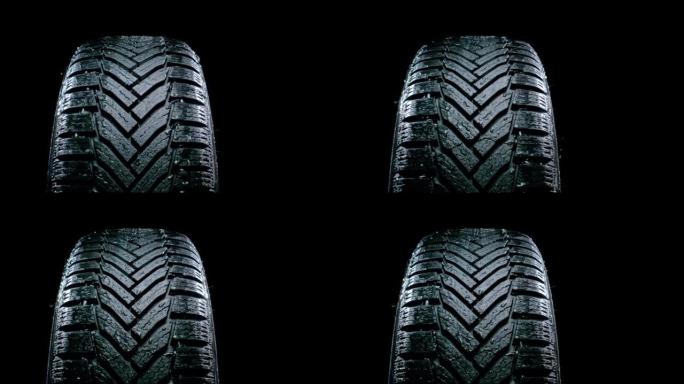 SLO MO LD湿品牌新款汽车轮胎在黑色背景下旋转