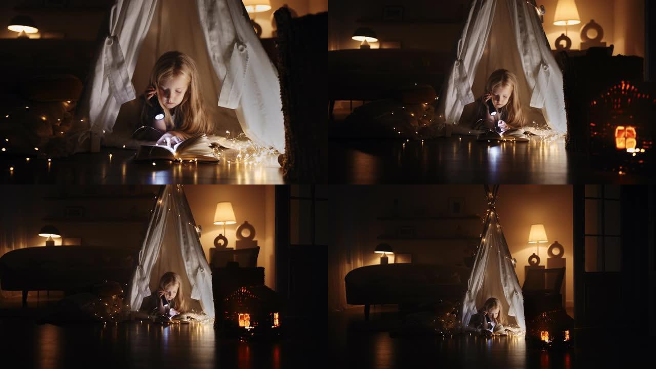 变焦相机后退一个小女孩晚上在帐篷里的房子里，用手电筒和花环看书