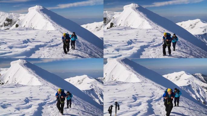 登山朋友升雪，走向山顶