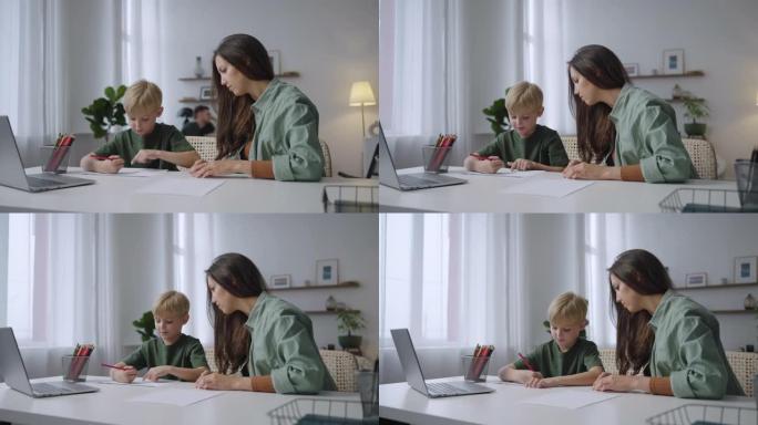 妈妈和儿子正在看笔记本电脑屏幕，分析远程学习的课程。学习外语，一起学习数学。
