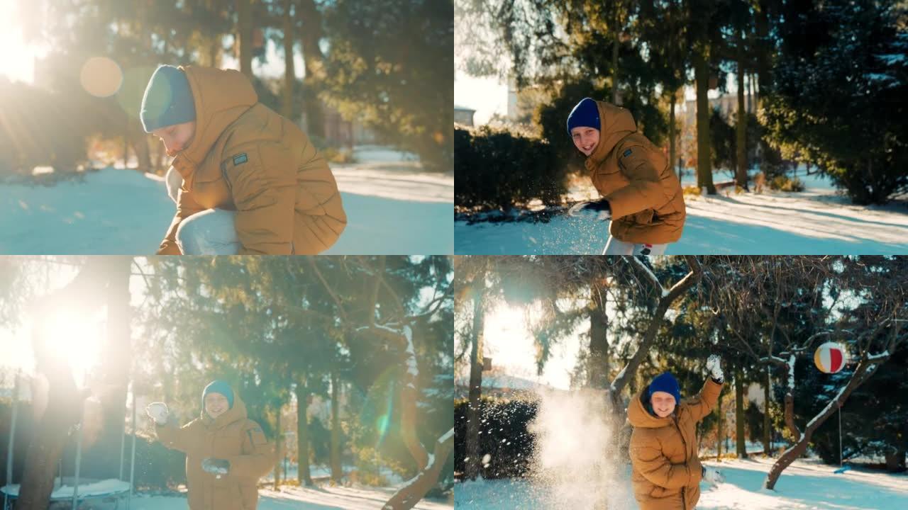 男孩向相机扔雪球俄罗斯小男孩冬天寒冷