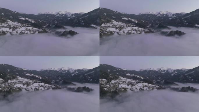 空中无人机在日出前拍摄了山脉附近的云海