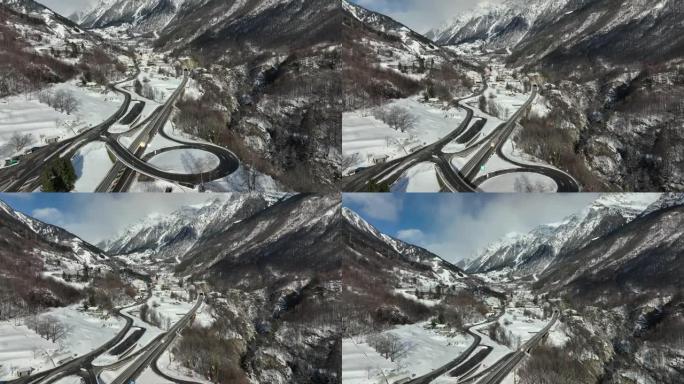 高山公路穿过积雪覆盖的山谷