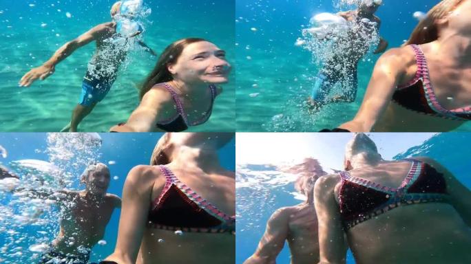 年轻女子在清澈的地中海游泳