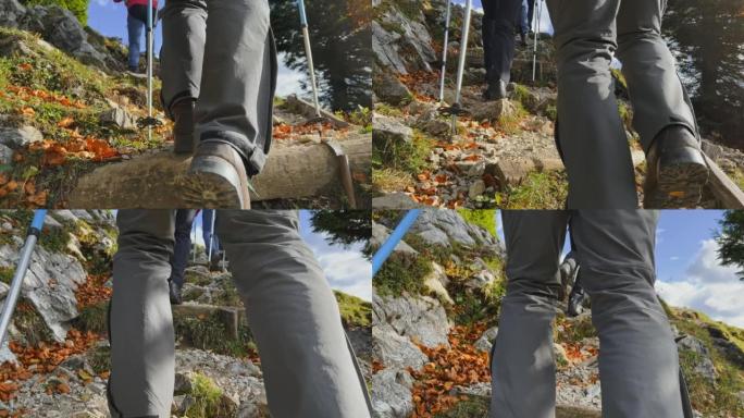 一名男性徒步旅行者的脚在岩石小径上行走