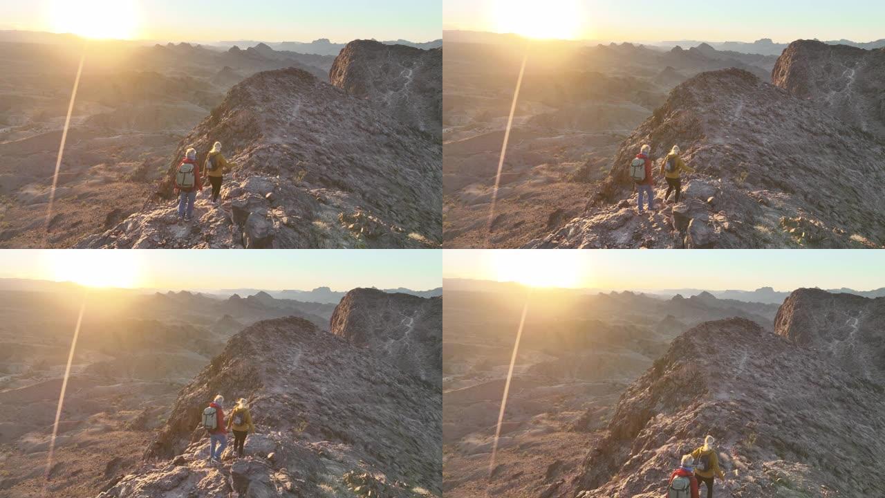 徒步旅行者上升岩石山脊的鸟瞰图
