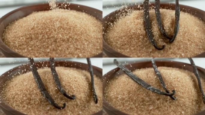香草豆以慢动作落在糖上。在幻影Flex 4k相机上拍摄。
