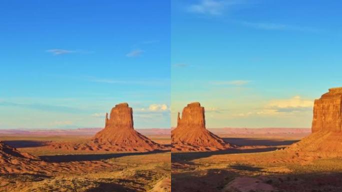 日落时的纪念碑谷。砂岩小山沙漠风景。垂直视频，延时