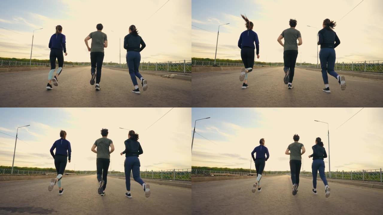 运动人士早上跑步，男性和女性人物的后视图，专业跑步者