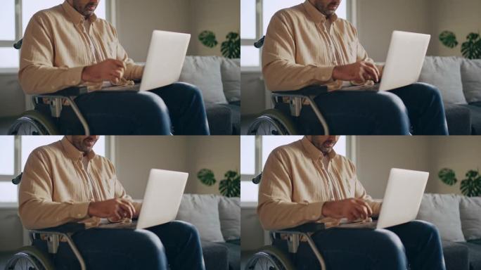 男性博客作者，残疾人士在家中笔记本电脑上打字，远程工作，互联网