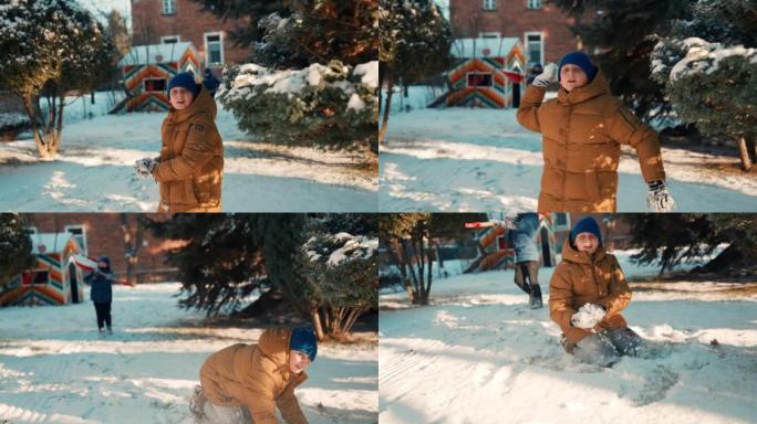兄弟们在雪地里玩耍。在户外享受冬天的乐趣。