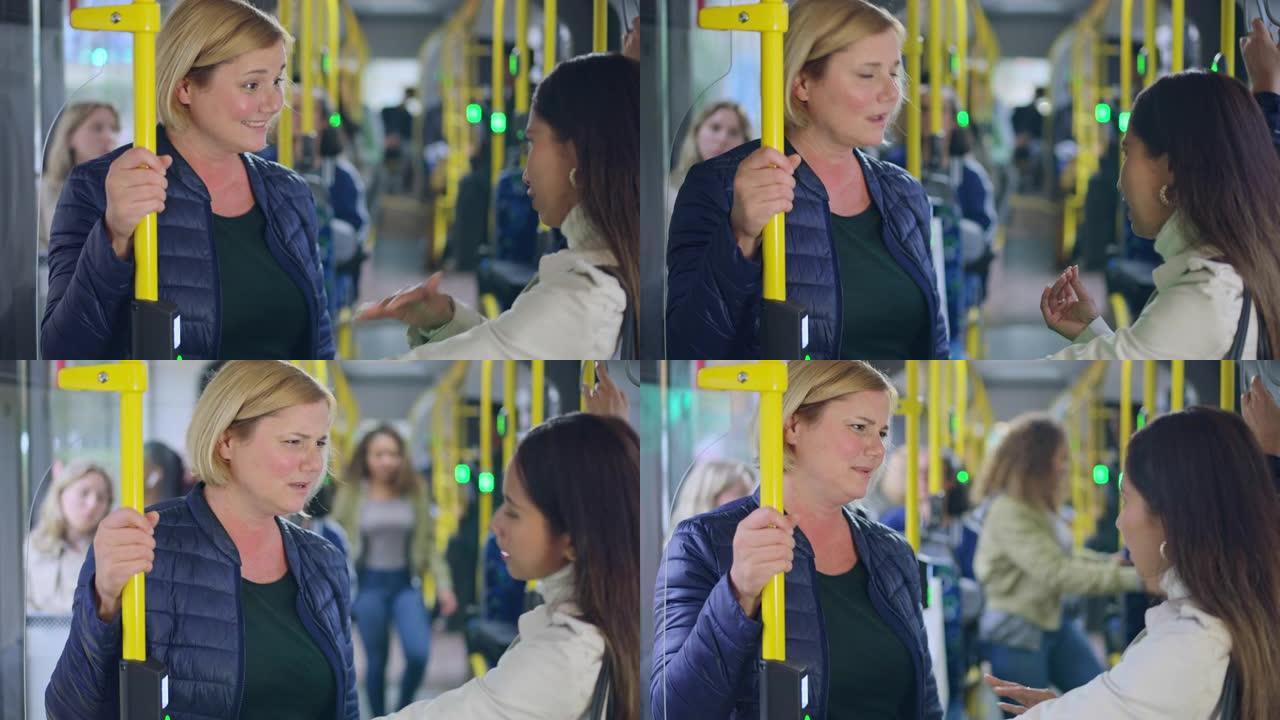 潘两个女人站在公共汽车上说话