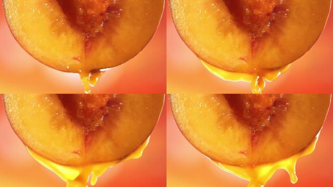 半桃流淌桃汁的慢动作宏观镜头