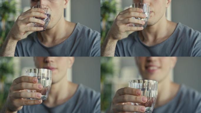 年轻人喝一杯水