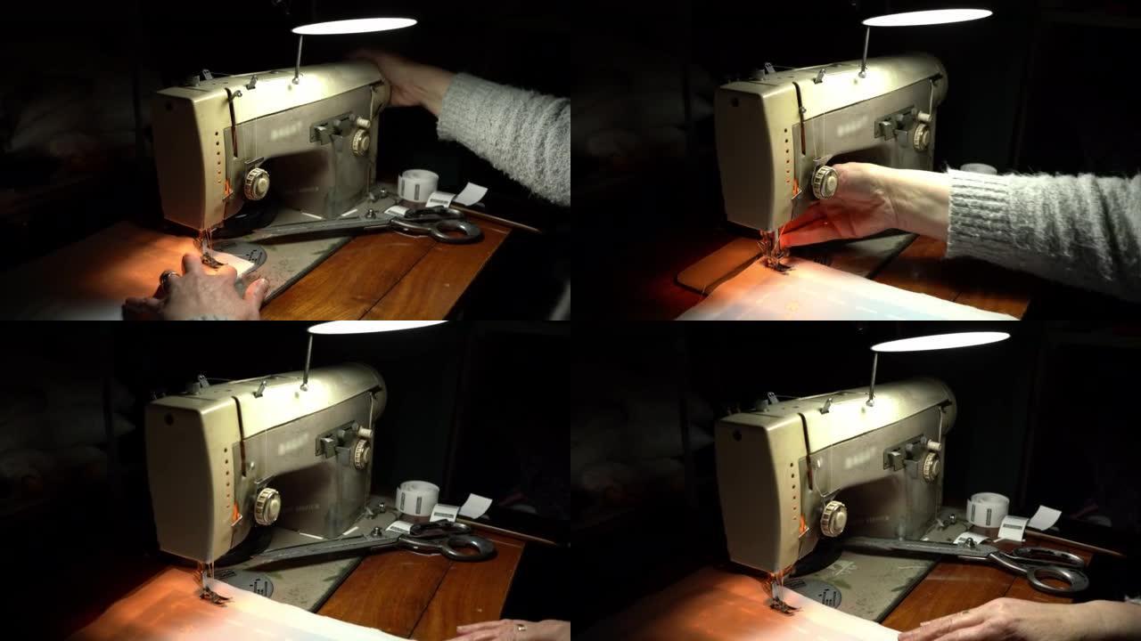 B-roll of unrecognizable tailor sawing on a sawing