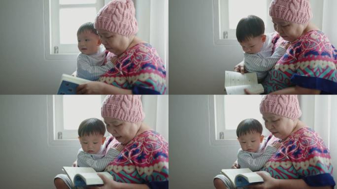 患有癌症: 高级妇女和她的孙子一起读书