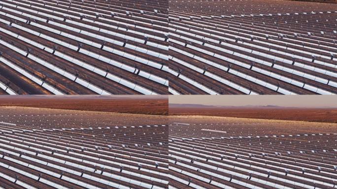 沙漠空中抛物线槽太阳能发电厂的照耀镜子
