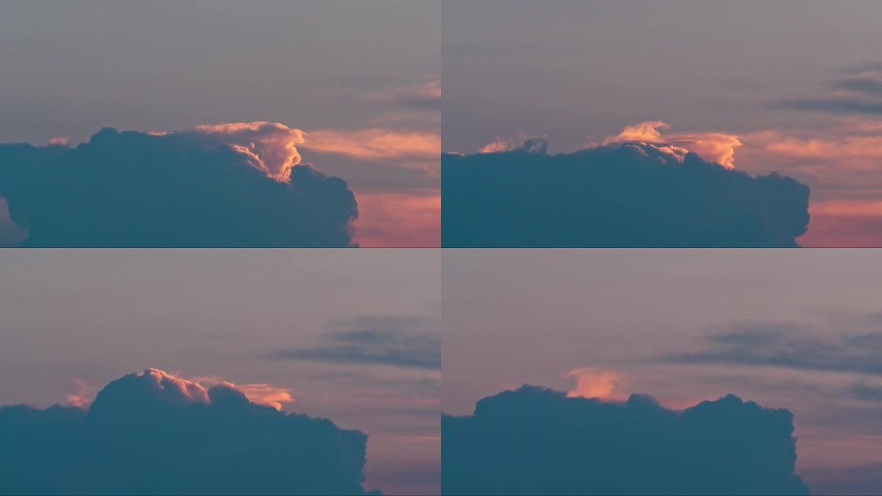 傍晚下雨后，日落云的4k延时镜头，戏剧性的云在蓝天上滚动。