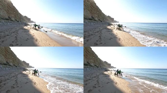 夫妇在沿海岩石上享受海边时光