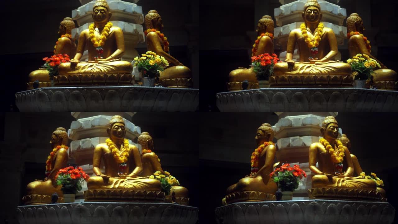 佛寺中的金像坐在莲花位置的柱子上