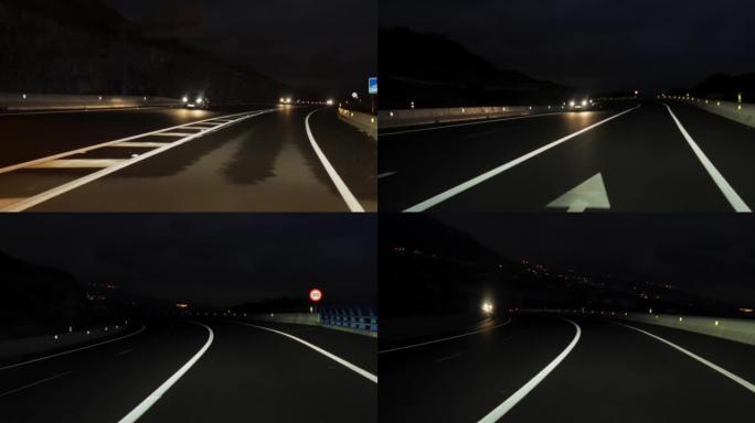 夜间在高速公路上通过隧道行驶的汽车视点