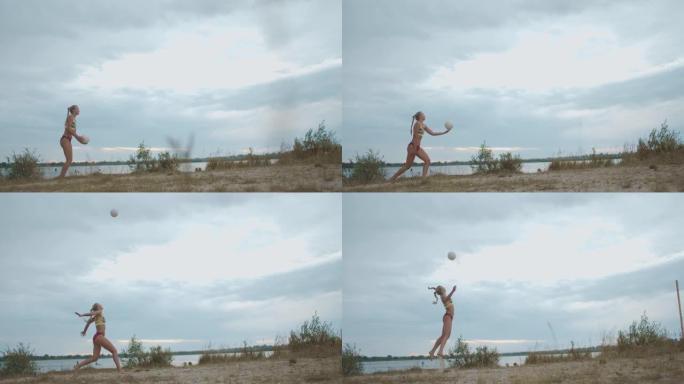 沙滩排球运动员女子正在大自然中训练发球，慢动作全程射门