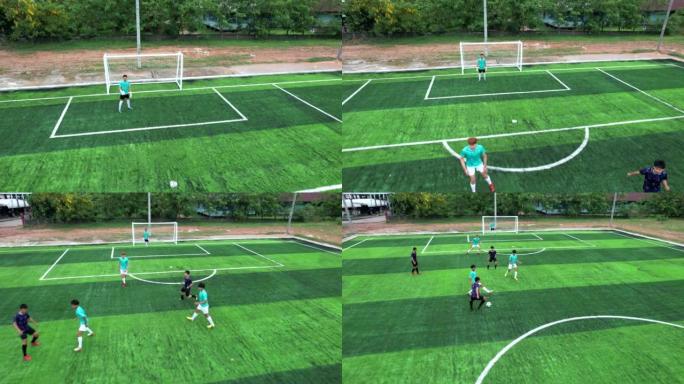 鸟瞰图，五人制足球队运动员，空中室外体育场人造草。