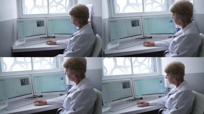 医生在诊所的电脑上工作