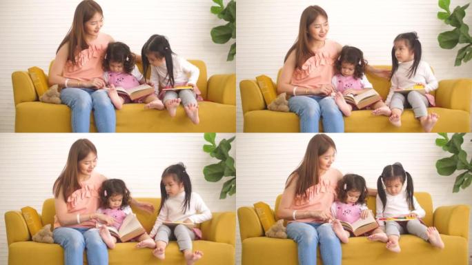 可爱的妈妈和她的孩子一起看书