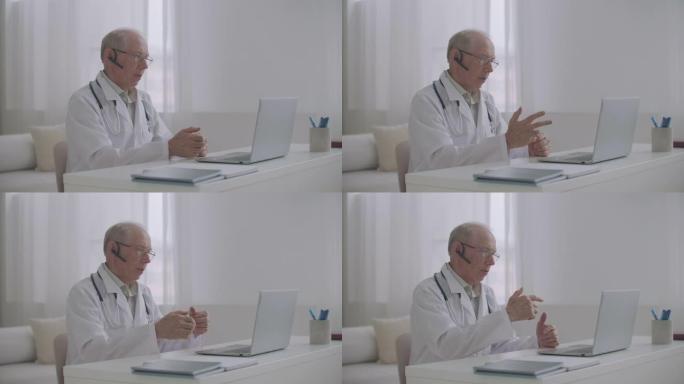 经验丰富的老年男性医学教授正坐在办公室在线授课，教学生