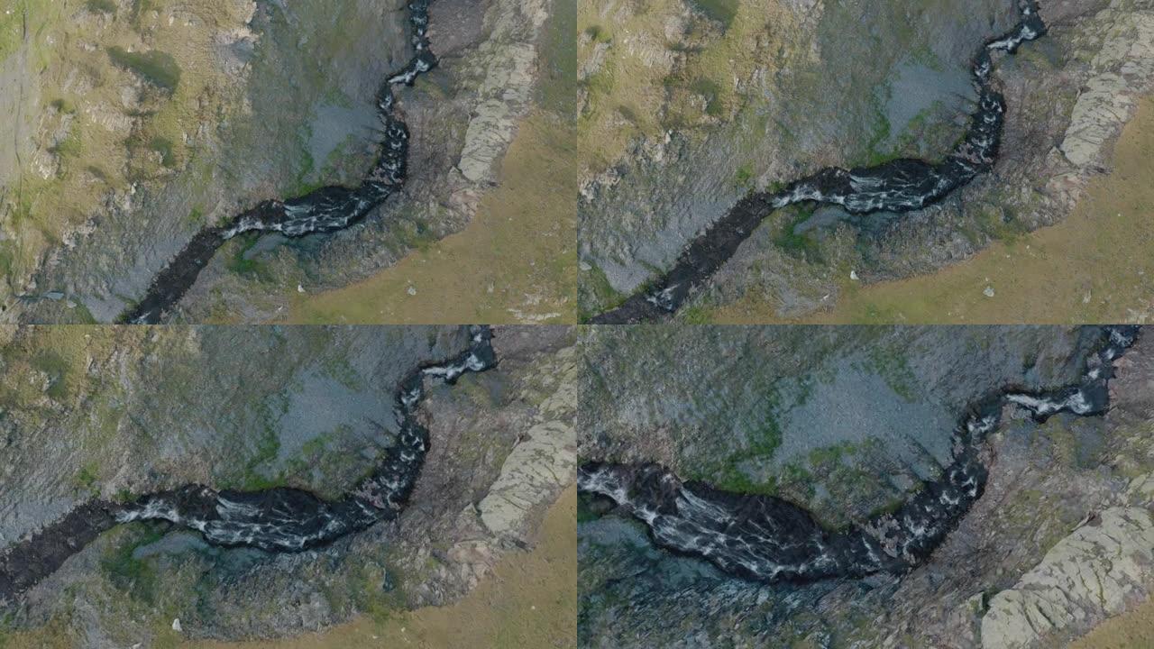 空中无人机拍摄了瑞士阿尔卑斯山的一条河流