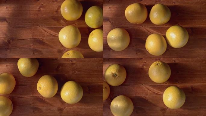 SLO MO LD葡萄柚在桌子上滚动