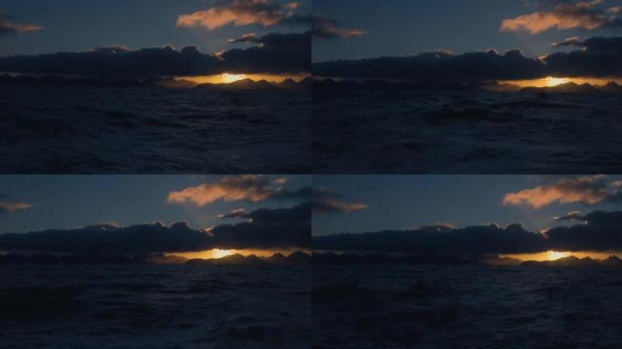 从船上看波涛汹涌的大海，雄伟的日落
