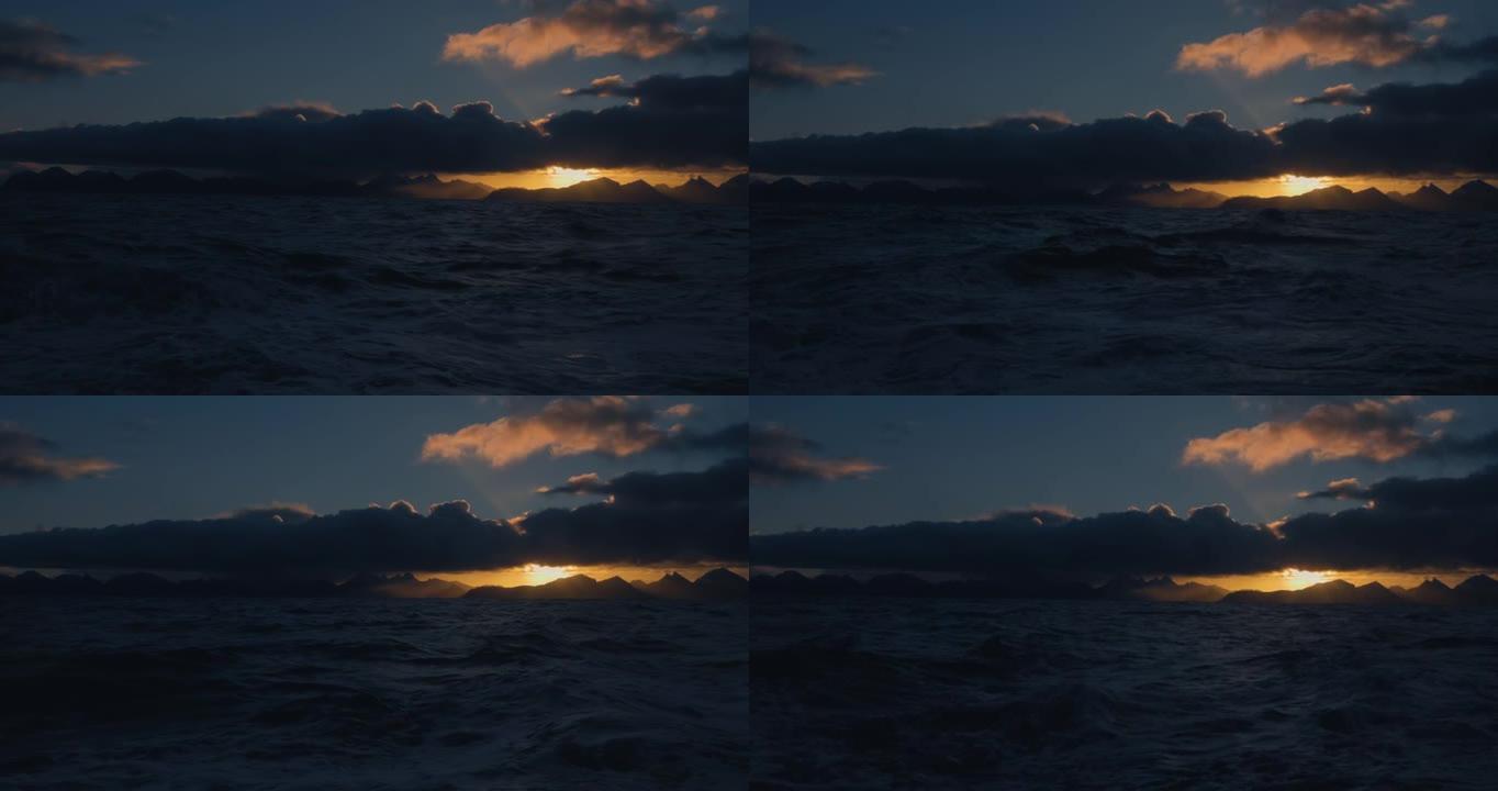 从船上看波涛汹涌的大海，雄伟的日落