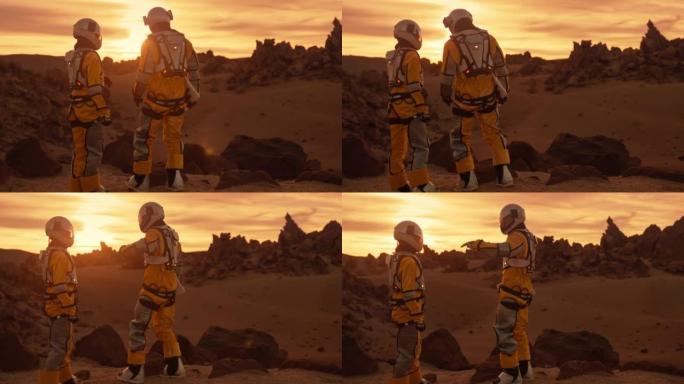 火星上的两名宇航员。欣赏外星星球上的景色
