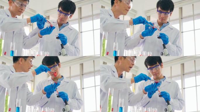 现代实验室有两位科学家进行实验。