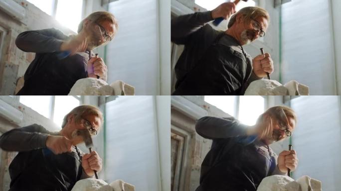 男雕塑家在他的工作室里用手工工具雕刻雕塑