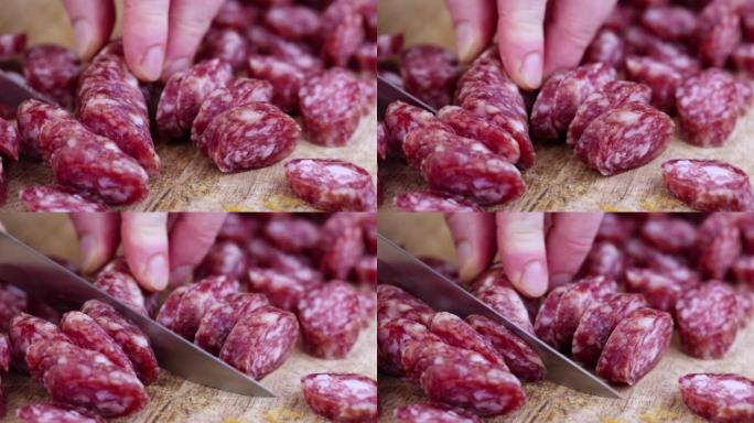 cut into pieces thin sausage with lard on a wooden