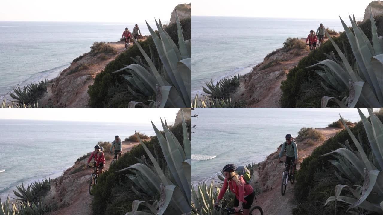 沿海悬崖上的情侣山地自行车